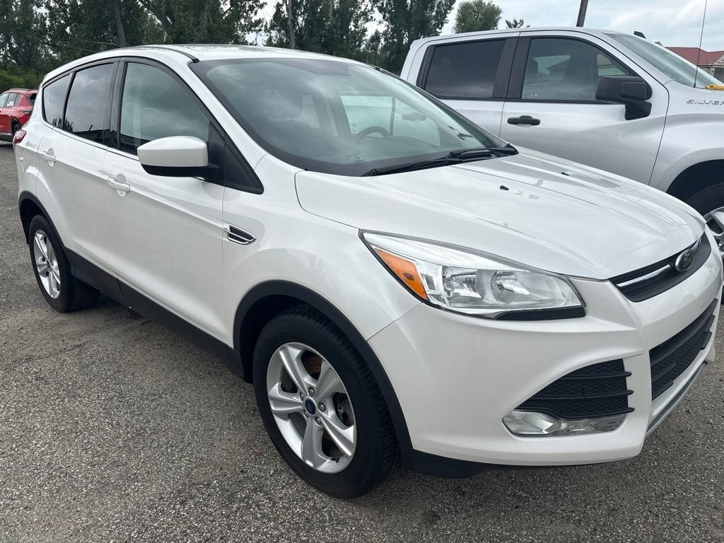 2015 Ford Escape SE in White — front three-quarter view