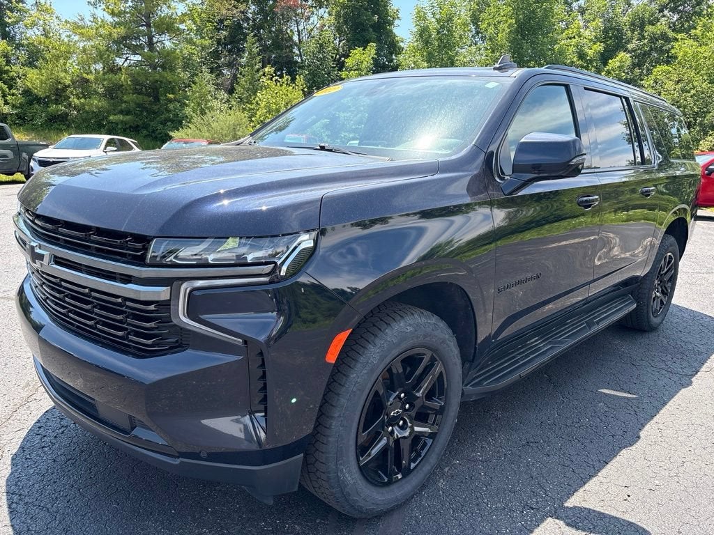 2022 Chevrolet Suburban RST in Midnight Blue Metallic — front three-quarter view