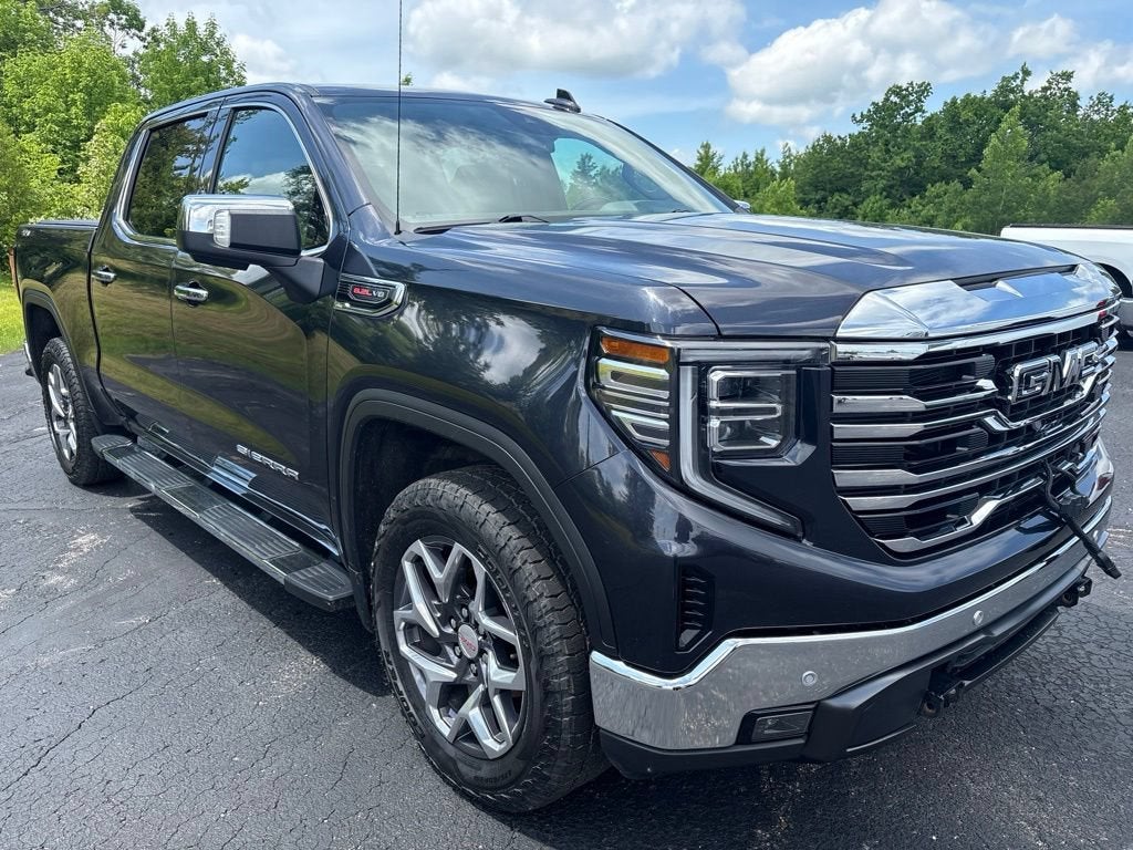 2022 GMC Sierra 1500 SLT in Titanium Rush Metallic — front three-quarter view