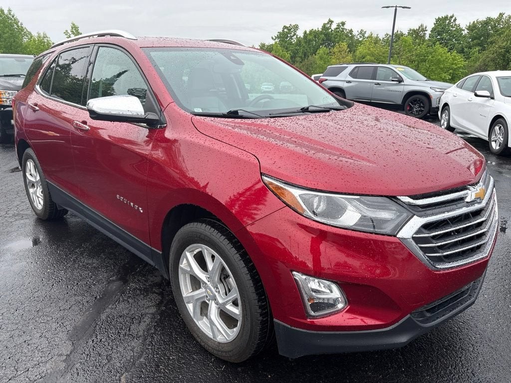 2018 Chevrolet Equinox Premier in Cajun Red Tintcoat — front three-quarter view