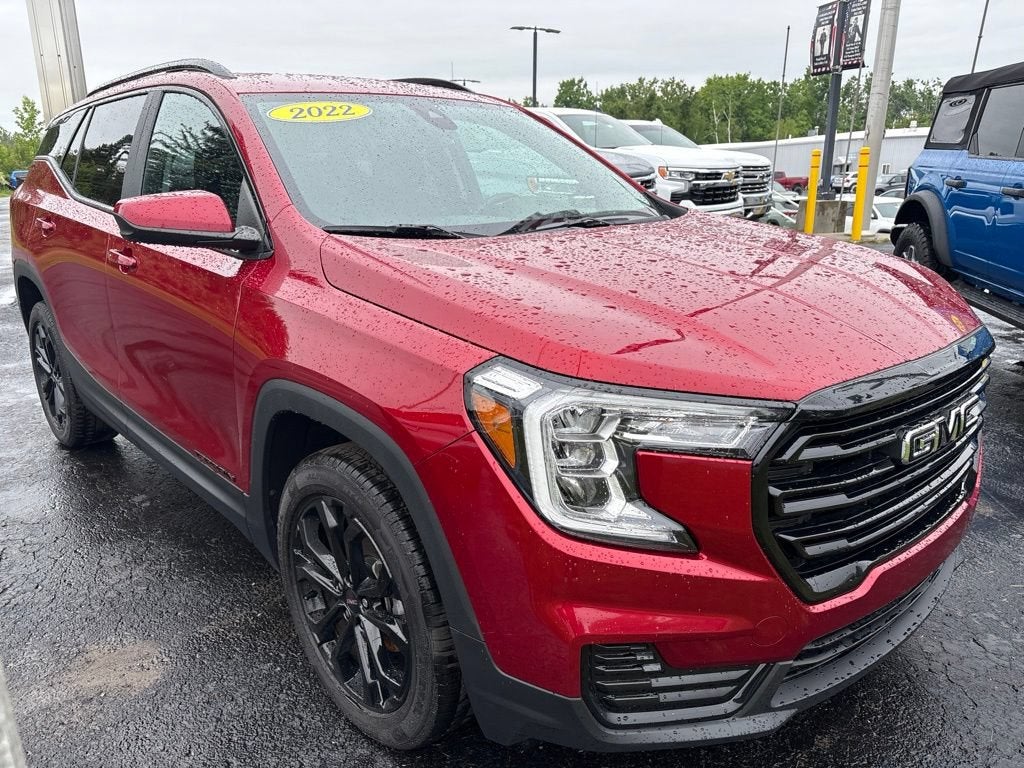 2022 GMC Terrain SLE in Cayenne Red Tintcoat — front three-quarter view