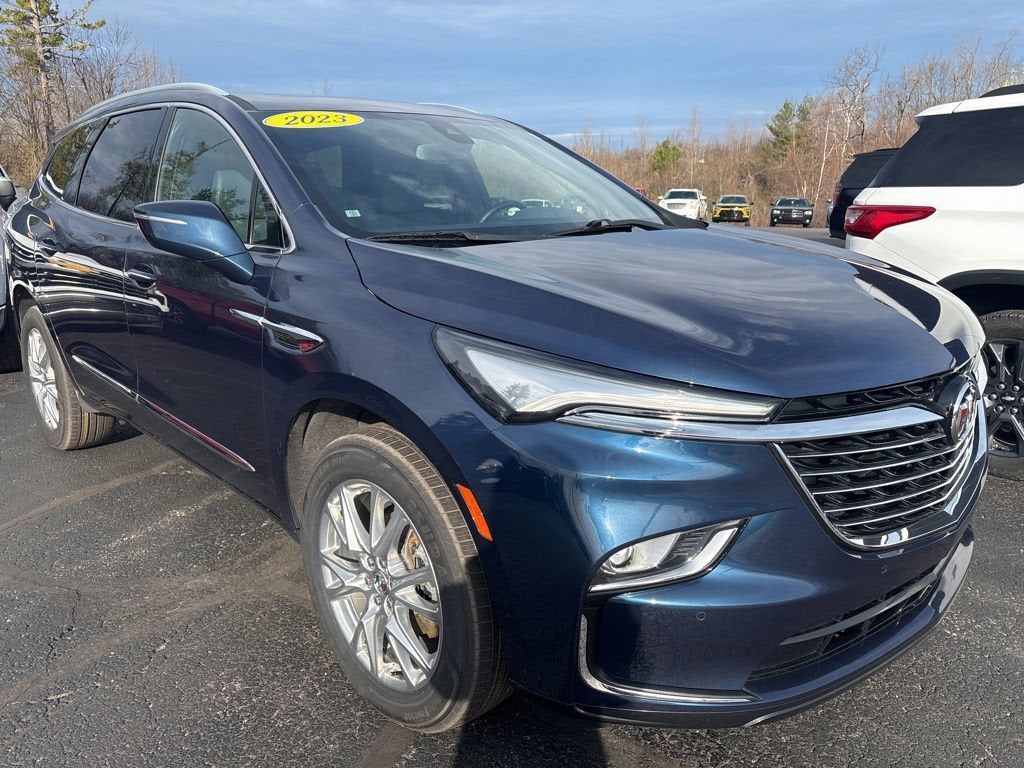 2023 Buick Enclave Essence in Emperor Blue Metallic — front three-quarter view